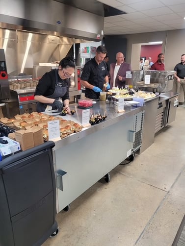 Chefs Preparing Dishes at Memphis Test Kitchen Opening